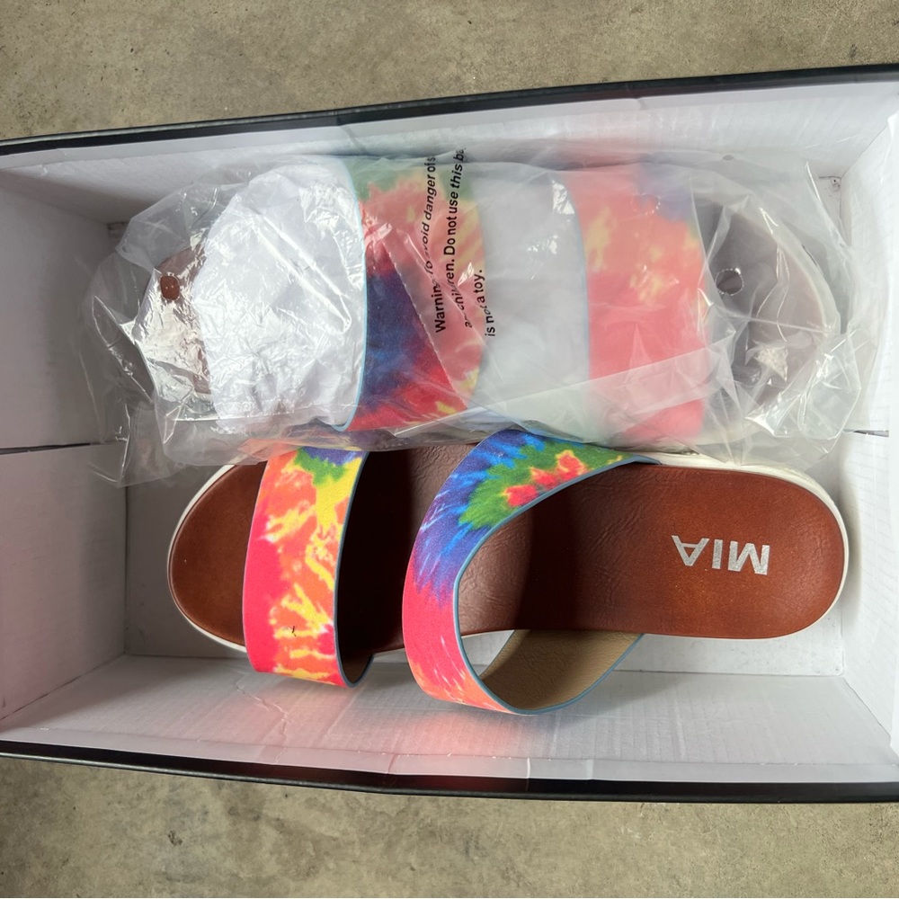 Colorful slides never worn.
